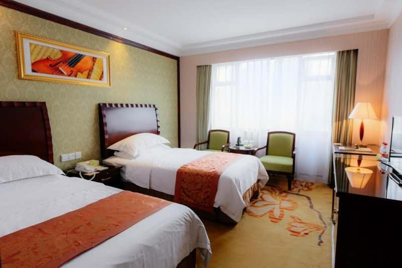 Vienna International Hotel Shanghai Train Station Habitación foto